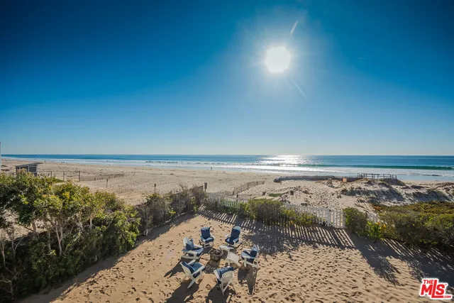 a room with a bed and a curtain