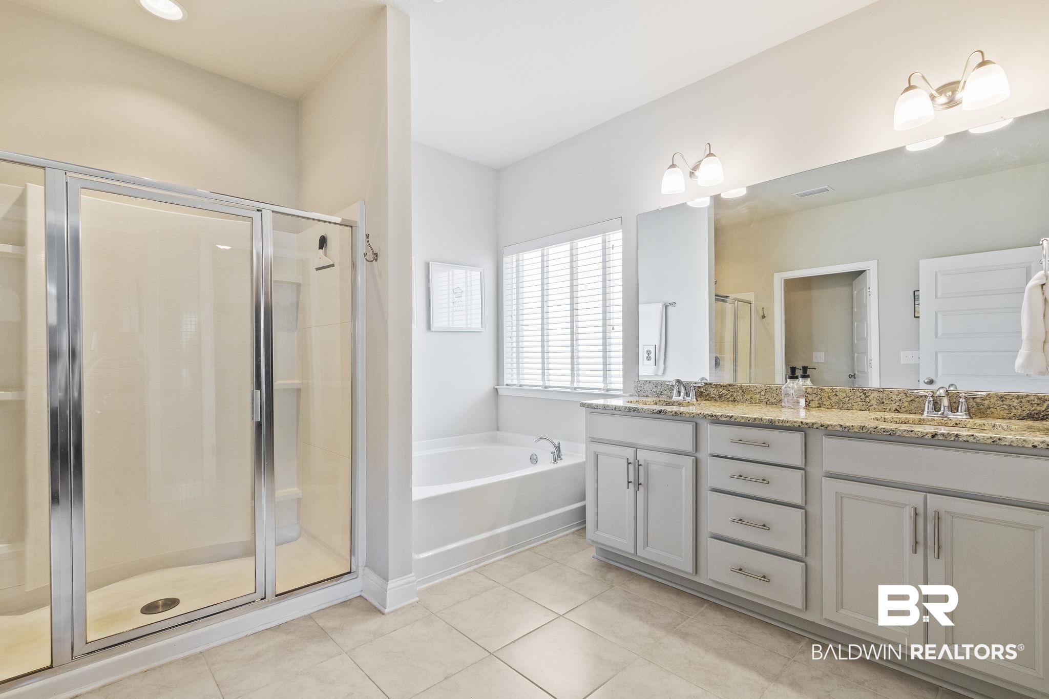 31663 Kestrel Loop Daphne, AL 36527 - Photo 37 of 86 Bathroom featuring tile patterned flooring, vanity, and shower with separate bathtub