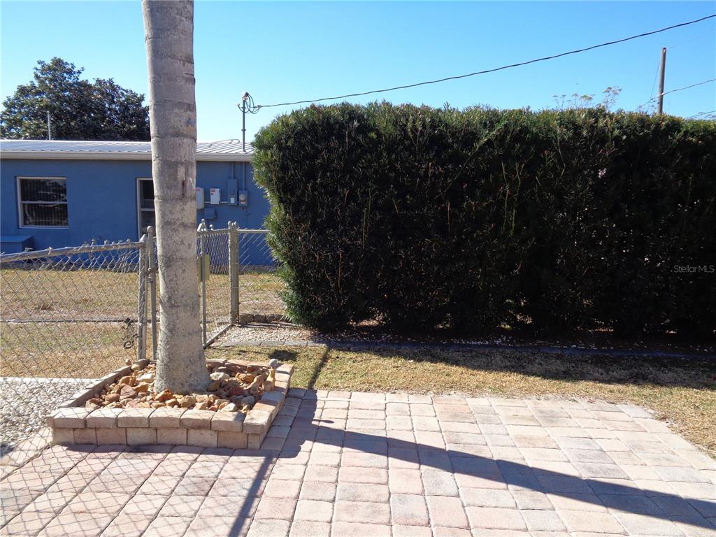 88 Yale Avenue Frostproof, FL 33843 - Photo 12 of 39 a view of a backyard of the house