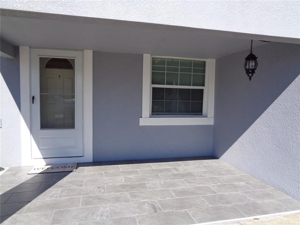 88 Yale Avenue Frostproof, FL 33843 - Photo 13 of 39 a view of an empty room with a window