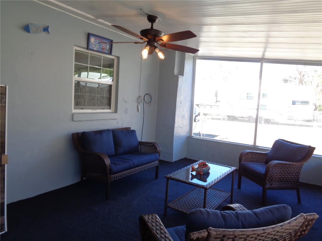 88 Yale Avenue Frostproof, FL 33843 - Photo 39 of 39 a living room with furniture and a large window