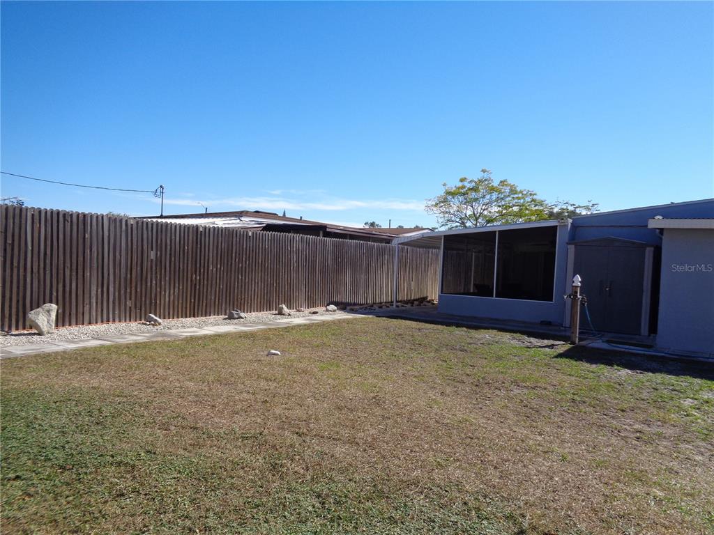 88 Yale Avenue Frostproof, FL 33843 - Photo 10 of 39 a view of a backyard