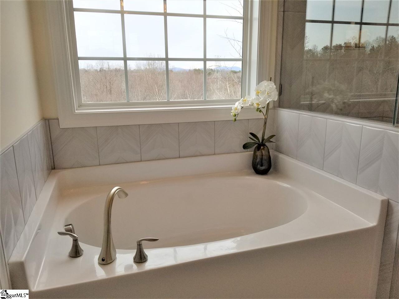 111 Foxfield Way Greer, SC 29651 - Photo 9 of 27 Master bathroom includes a tub with a view of the mountains!