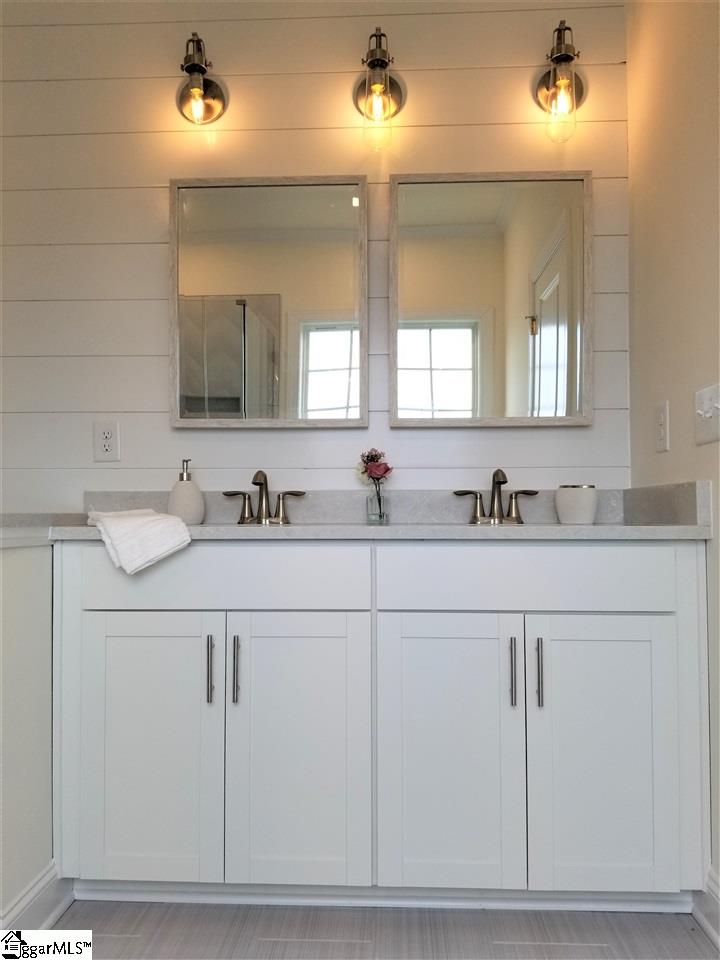 111 Foxfield Way Greer, SC 29651 - Photo 10 of 27 Double Vanity with toilet to the left. Walk-in closet through the bathroom.
