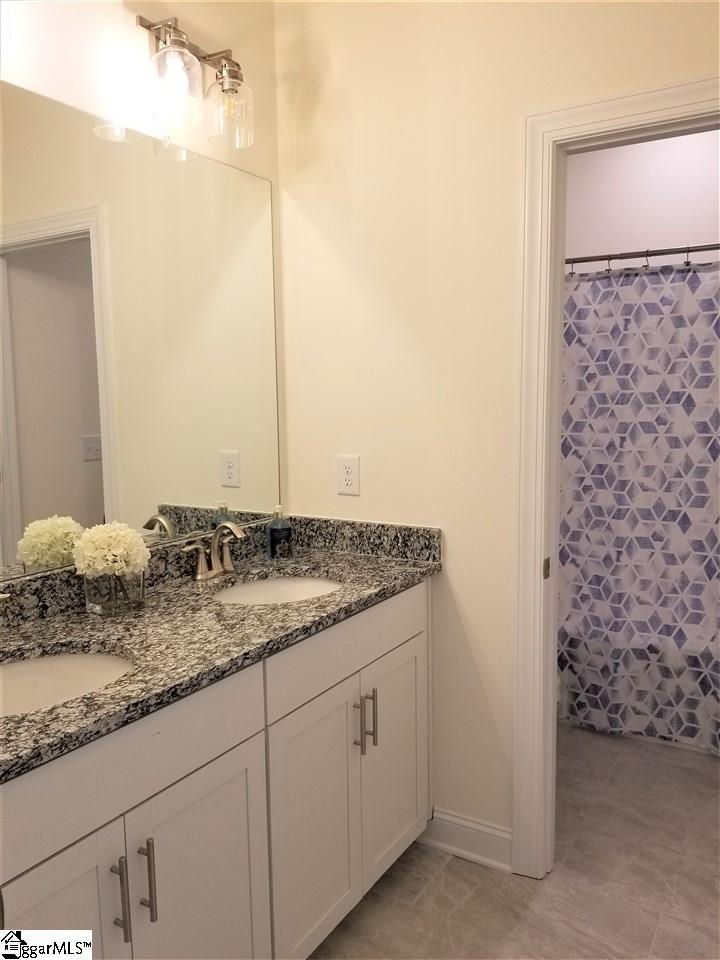 111 Foxfield Way Greer, SC 29651 - Photo 14 of 27 Double vanity bathroom with separate shower and toilet room on 2nd level.