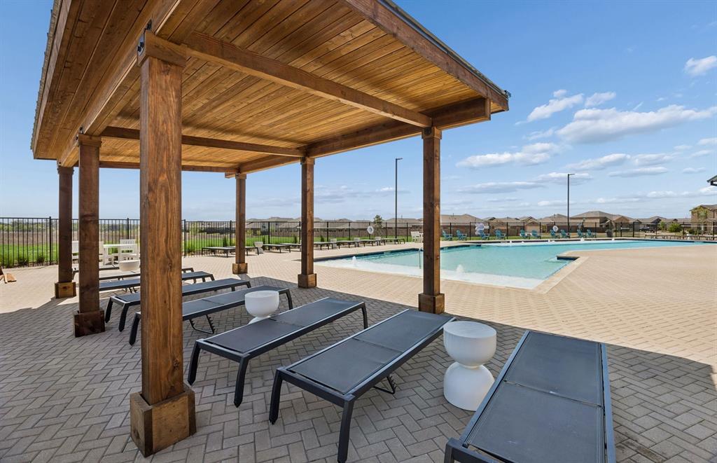 7509 Bent Gale Road Pilot Point, TX 76258 - Photo 22 of 26 a view of swimming pool with outdoor seating and city view