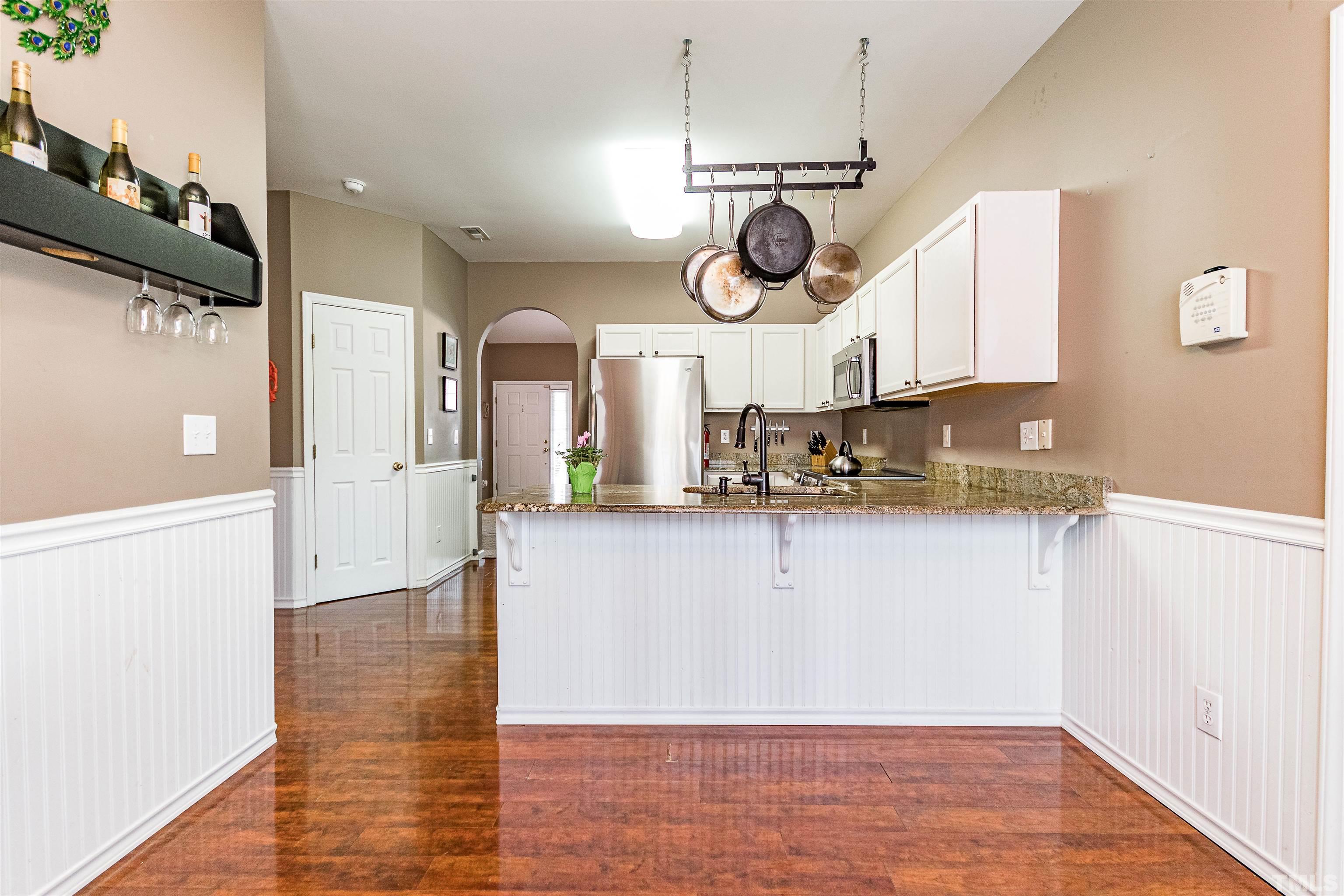 5405 Neuse Forest Road Raleigh, NC 27616 - Photo 13 of 31 a view of a kitchen with an oven
