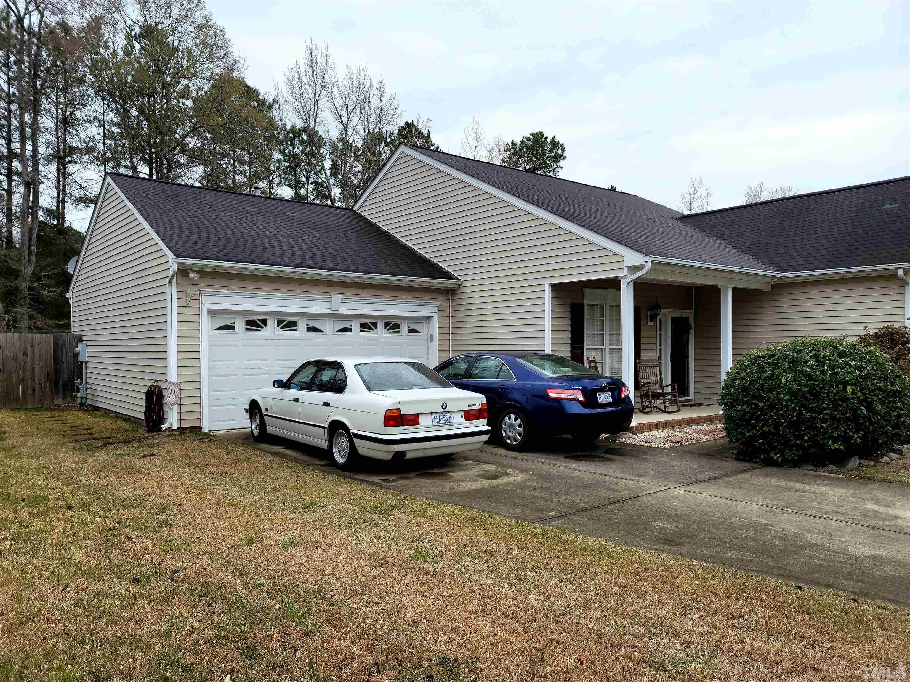 5405 Neuse Forest Road Raleigh, NC 27616 - Photo 2 of 31 a view of a house with truck parked in front of a house