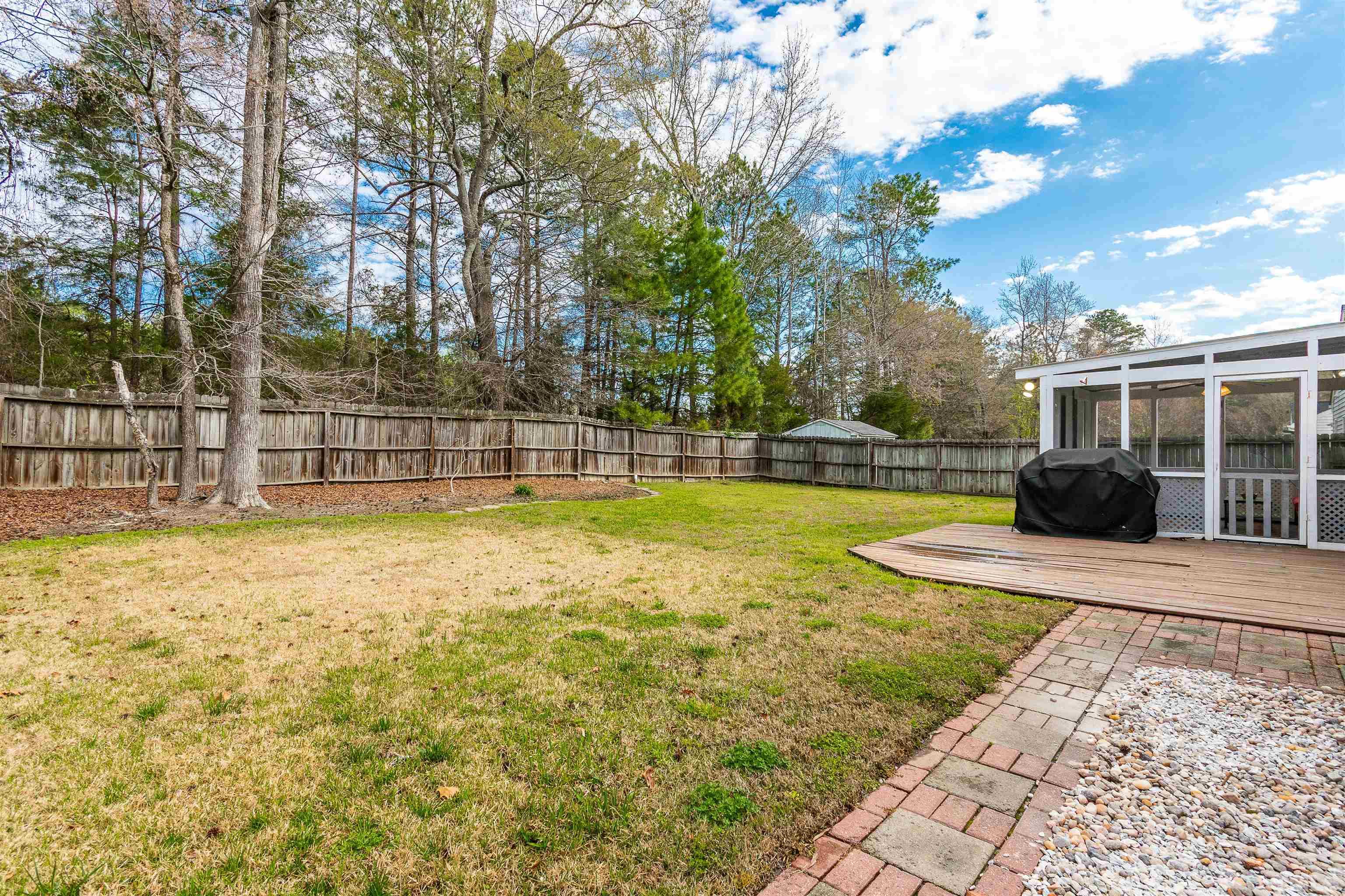 5405 Neuse Forest Road Raleigh, NC 27616 - Photo 8 of 31 a view of a yard with a small house