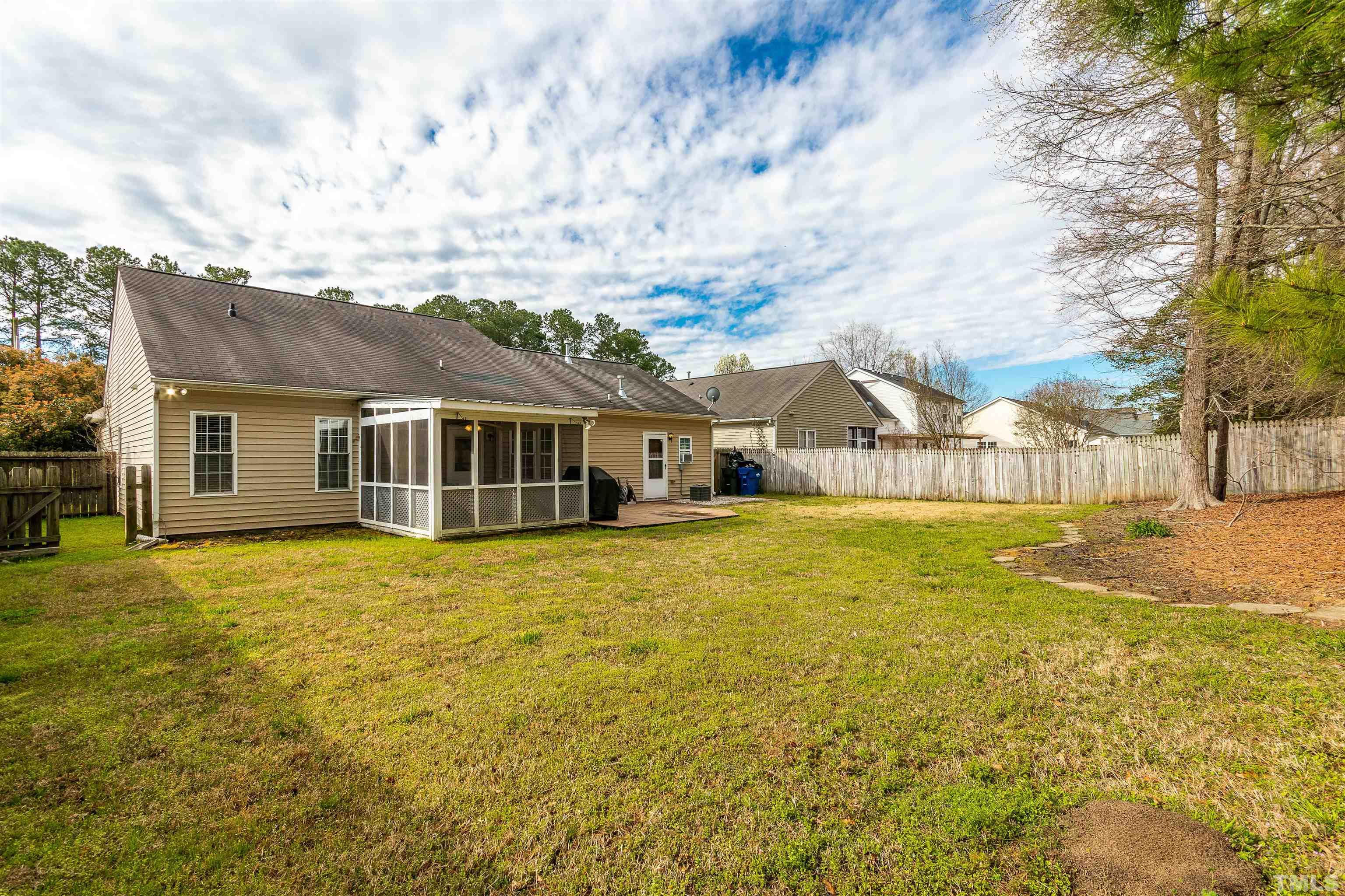 5405 Neuse Forest Road Raleigh, NC 27616 - Photo 10 of 31 a front view of a house with a garden