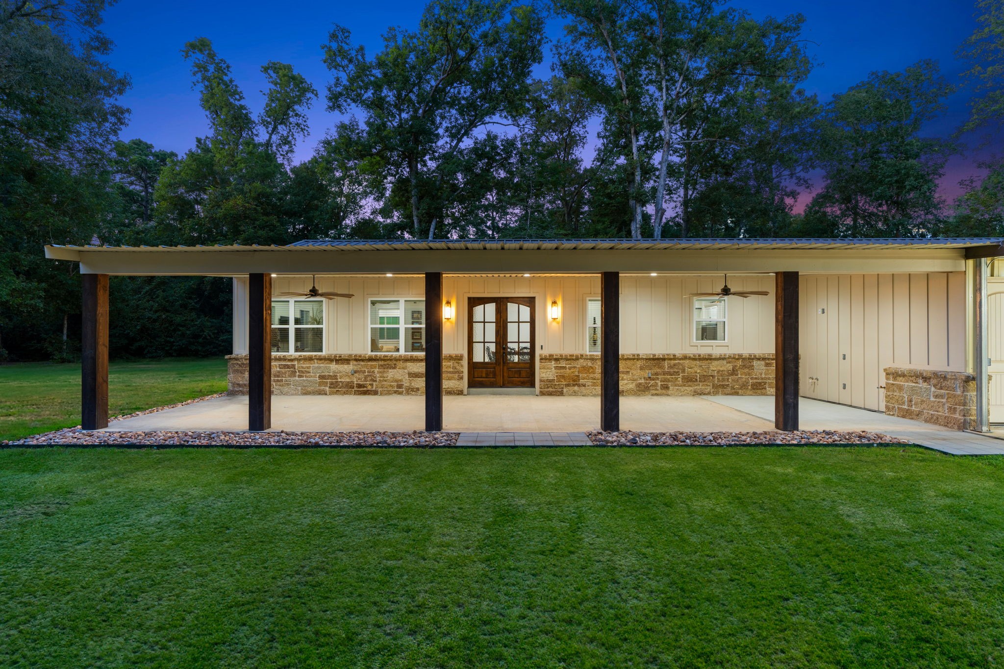 6970 Longmire Road Conroe, TX 77304 - Photo 11 of 48 a view of a house with a big yard