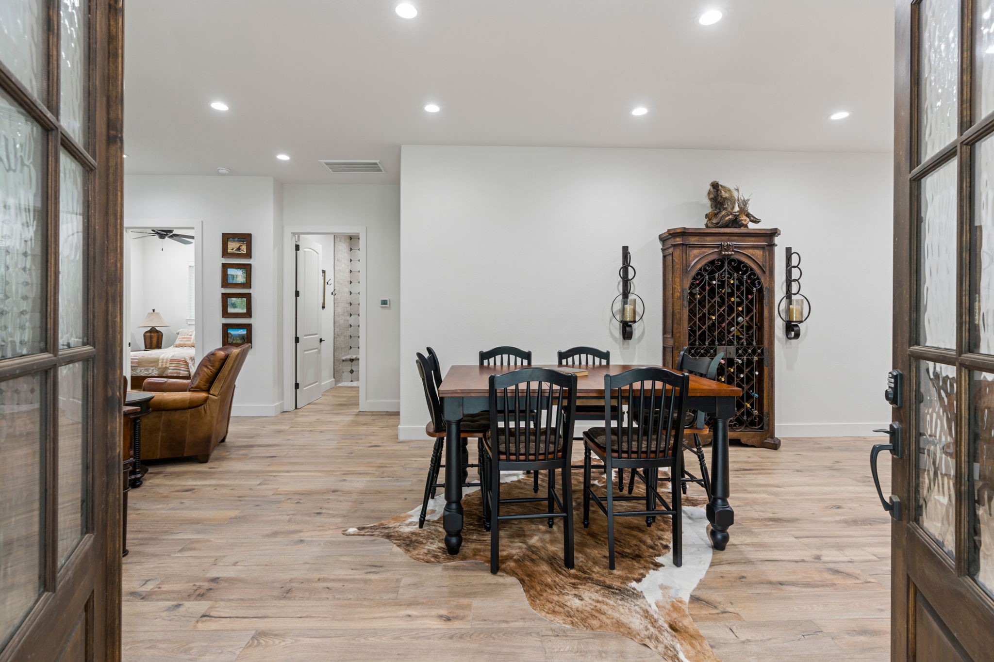 6970 Longmire Road Conroe, TX 77304 - Photo 14 of 48 a view of a dining room with furniture
