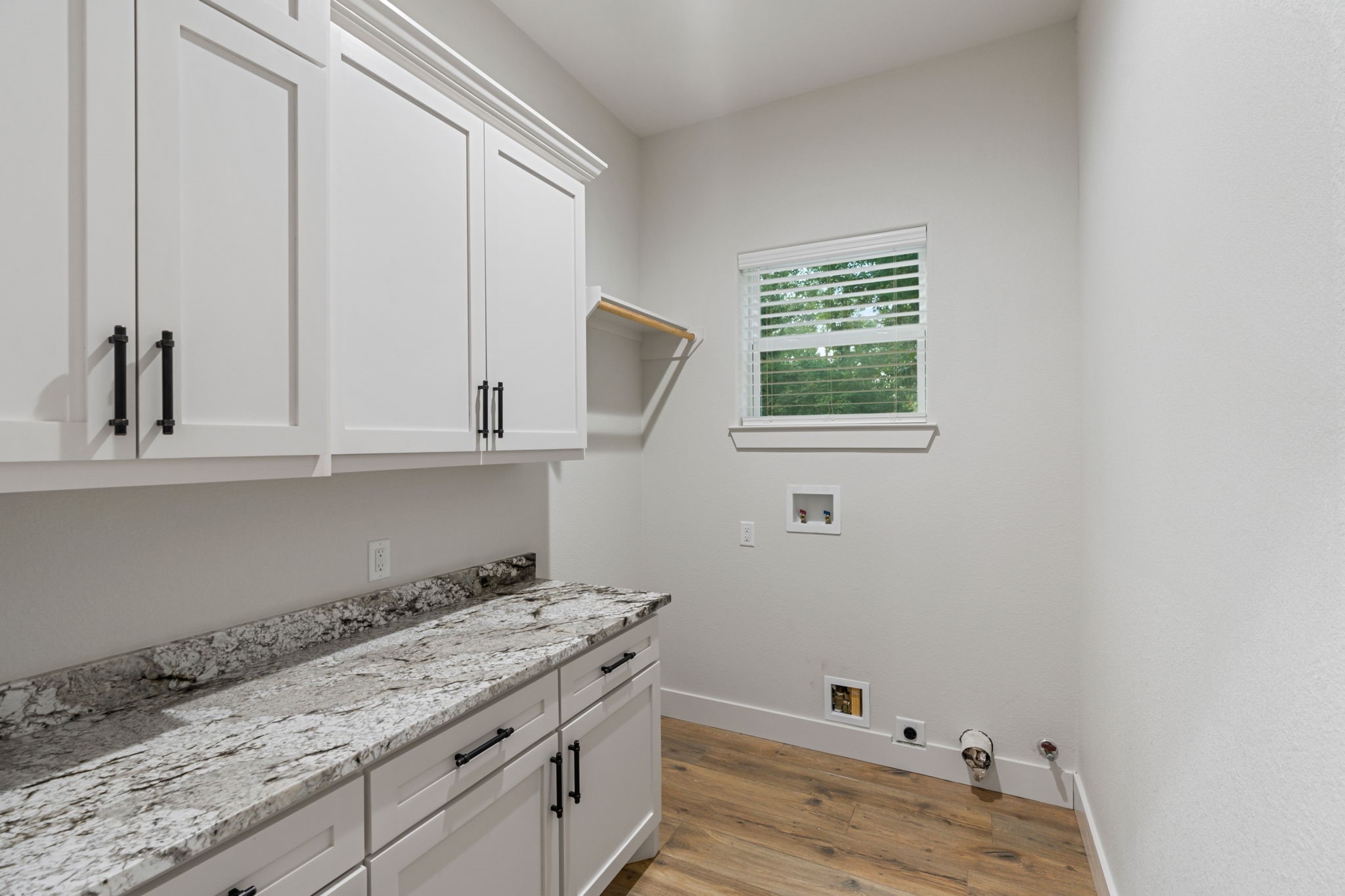 6970 Longmire Road Conroe, TX 77304 - Photo 34 of 48 a room with storage and utility