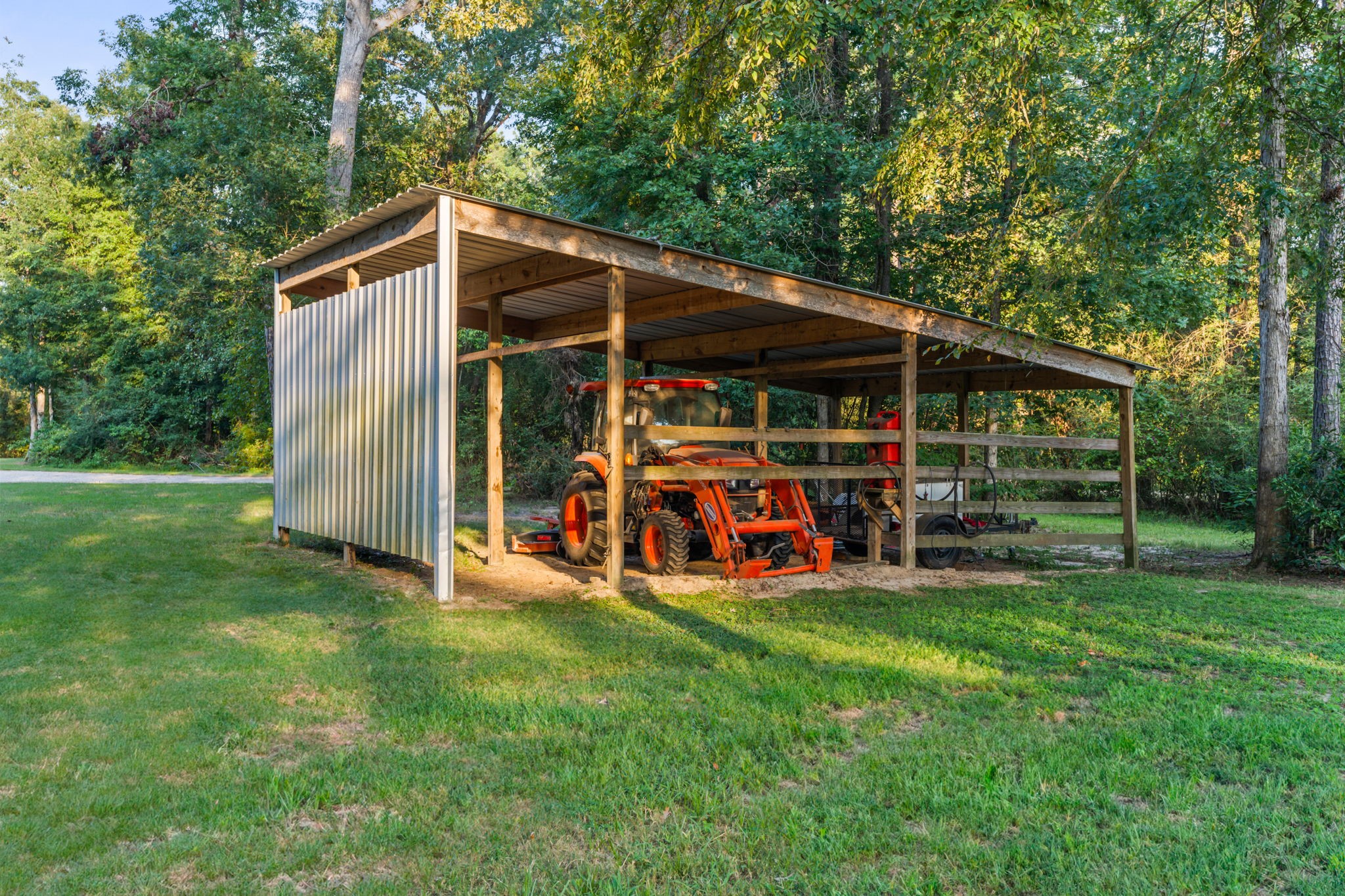 6970 Longmire Road Conroe, TX 77304 - Photo 41 of 48 a view of a car is parked in the yard