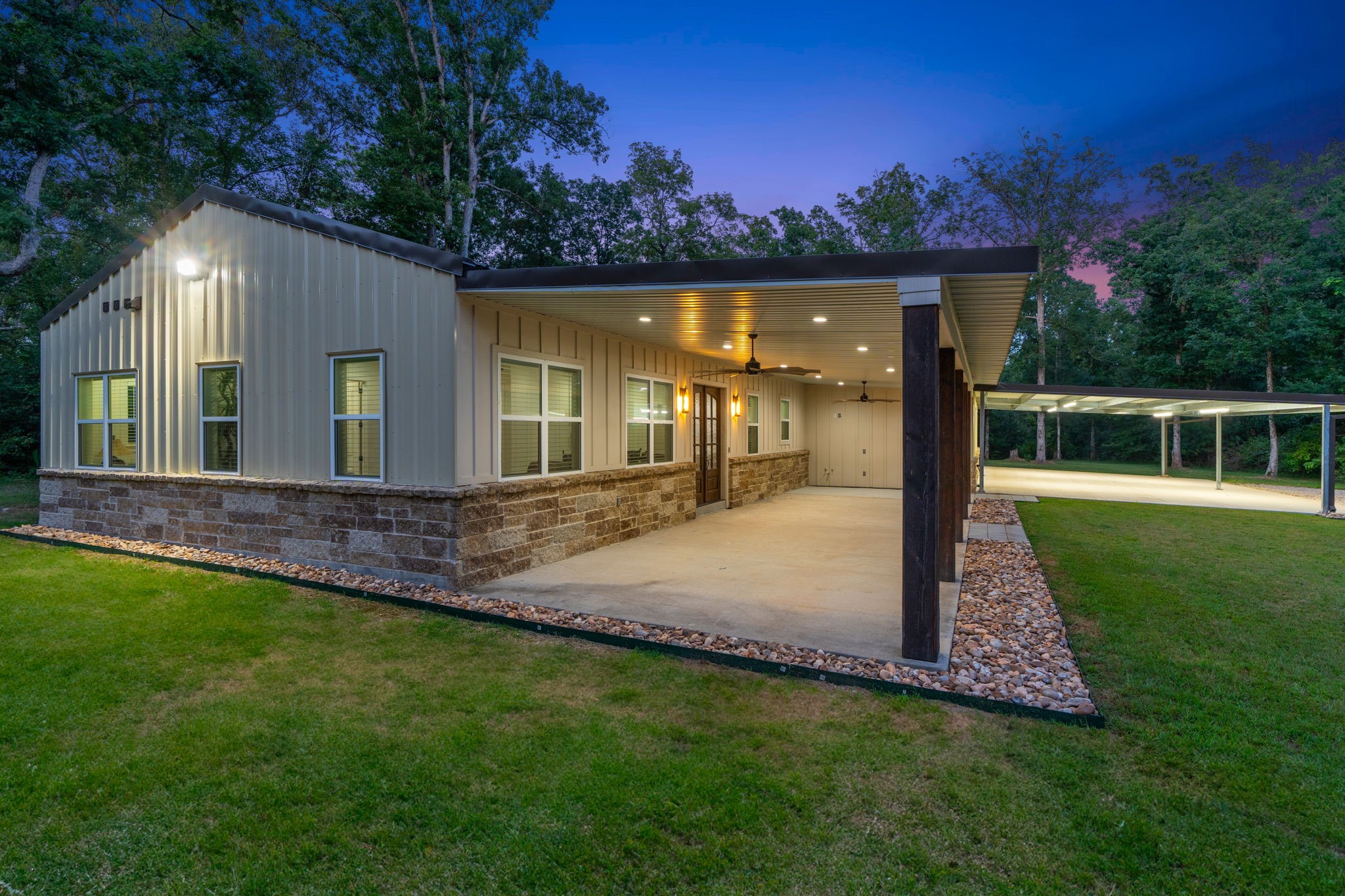 6970 Longmire Road Conroe, TX 77304 - Photo 43 of 48 a view of a house with a backyard