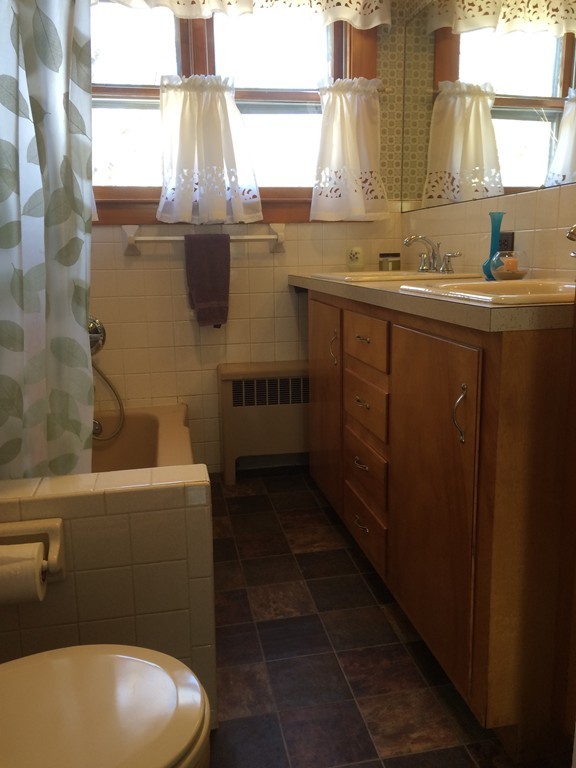 100 Leshure Road Rowe, MA 01367 - Photo 13 of 30 a bathroom with a sink a toilet and a mirror