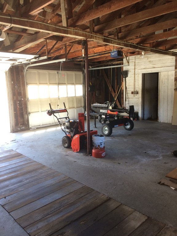 100 Leshure Road Rowe, MA 01367 - Photo 5 of 30 a view of a garage with chairs