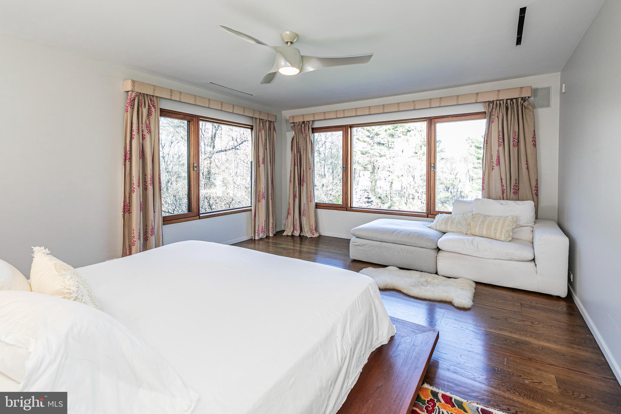 113 Westcott Road Princeton, NJ 08540 - Photo 18 of 36 a spacious bedroom with a large bed and a couch