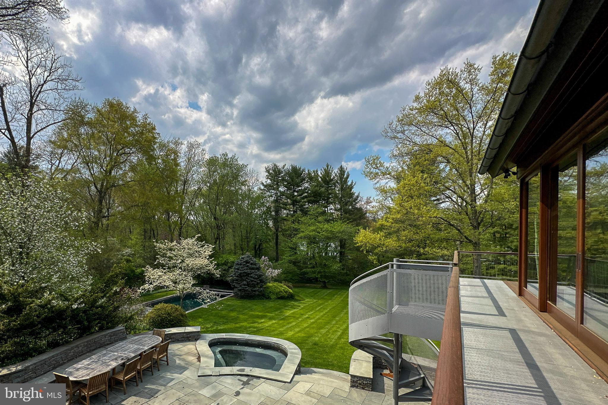 113 Westcott Road Princeton, NJ 08540 - Photo 2 of 36 a view of a two chairs and table in the balcony