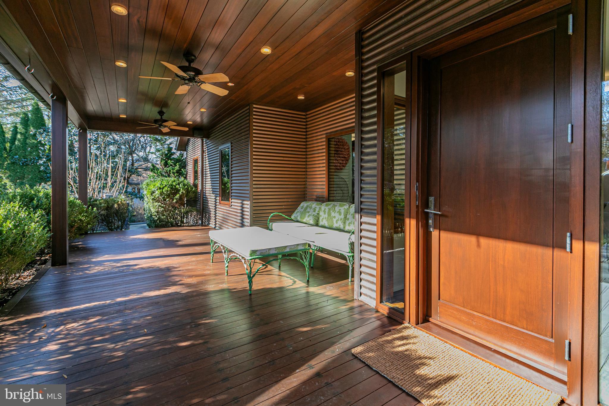 113 Westcott Road Princeton, NJ 08540 - Photo 4 of 36 a view of a porch with furniture and a yard