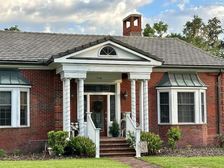 708 East Main Street Wauchula, FL 33873 - Photo 36 of 82 a front view of a house with a yard