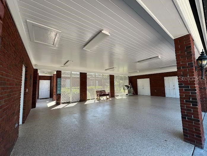 708 East Main Street Wauchula, FL 33873 - Photo 57 of 82 a view of a building stairs and a car parked