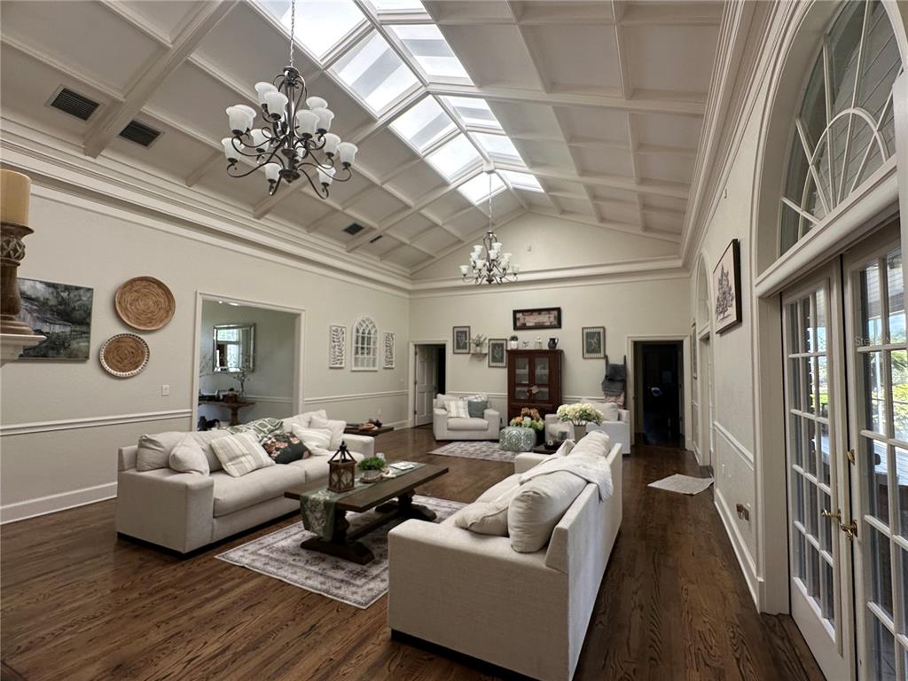 708 East Main Street Wauchula, FL 33873 - Photo 9 of 82 a living room with furniture and a chandelier