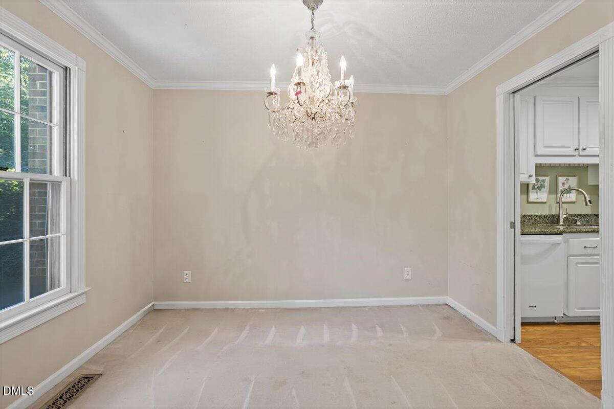 2870 Wycliff Road Raleigh, NC 27607 - Photo 10 of 41 Spacious formal Dining Room (chandelier does not convey)