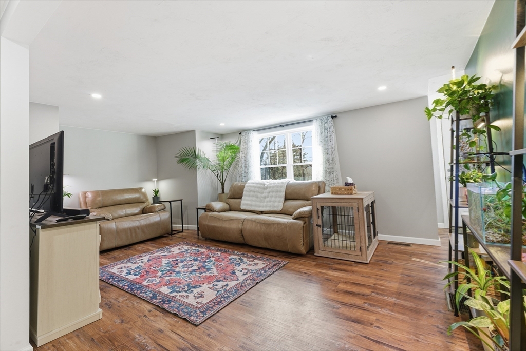 160 Cottage Street Athol, MA 01331 - Photo 15 of 35 a living room with furniture and a flat screen tv
