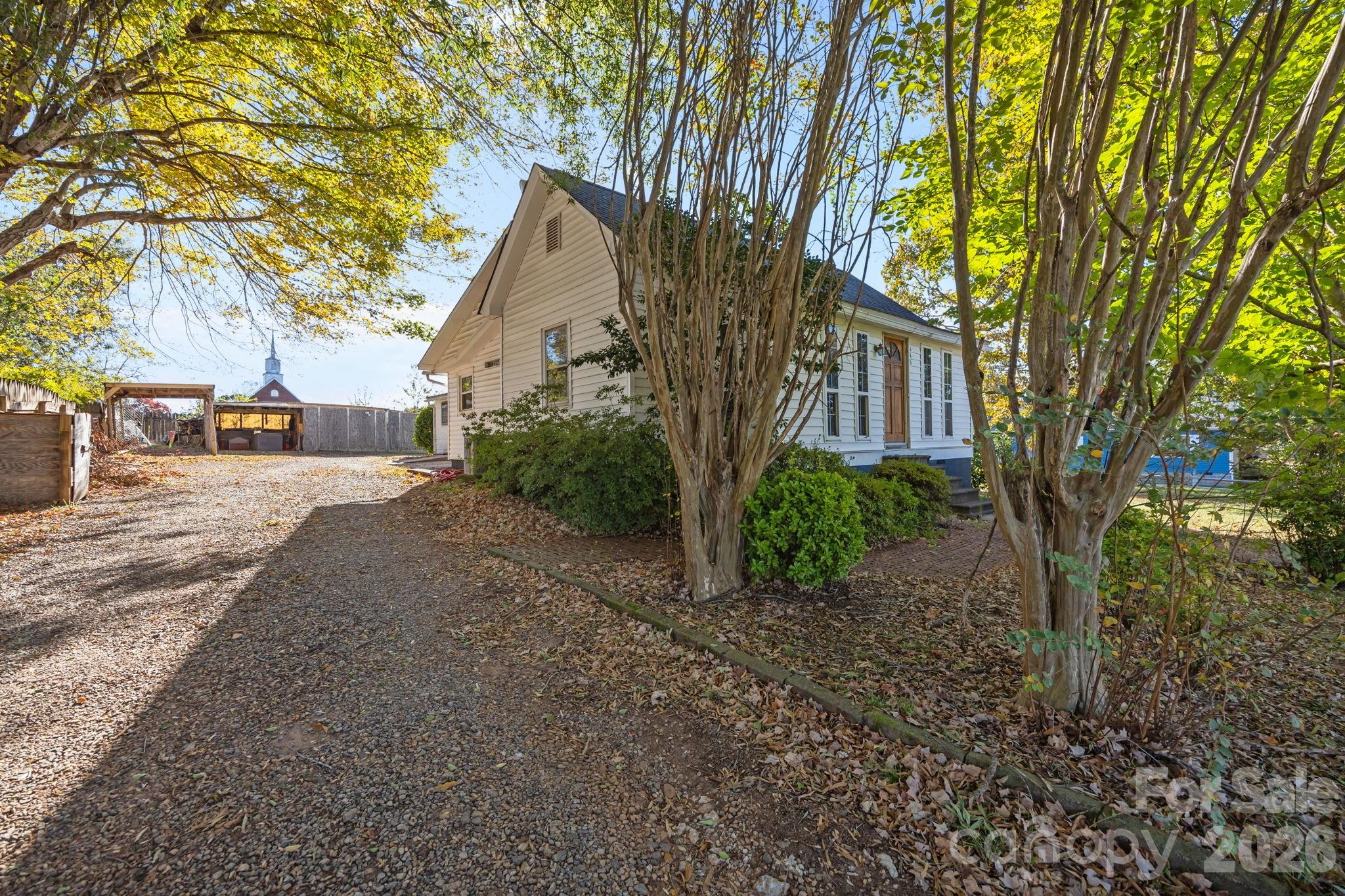 145 Duke Street Cooleemee, NC 27014 - Photo 25 of 27 a view of a house with a street