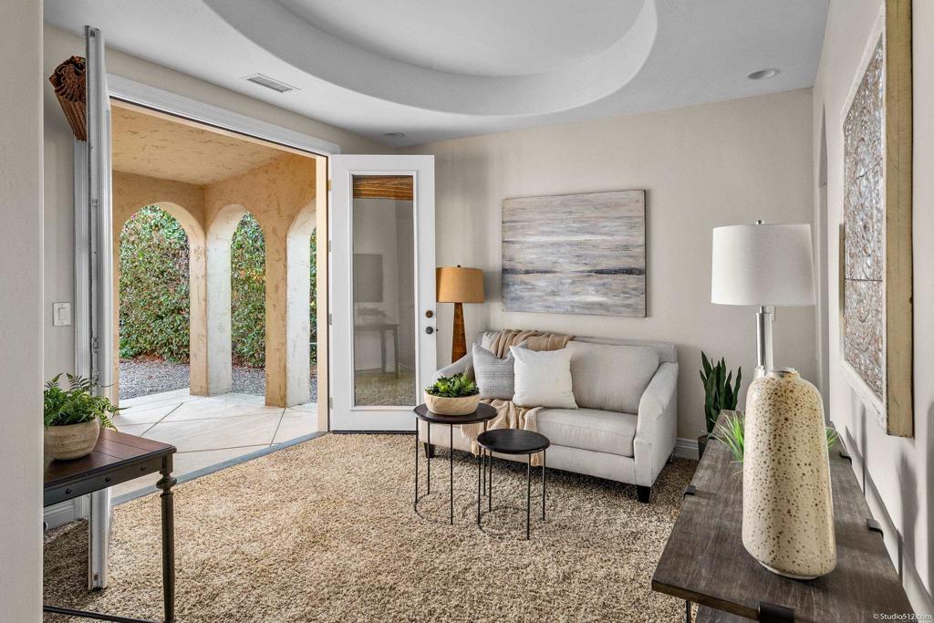 1455 Independence Way Vista, CA 92084 - Photo 18 of 31 a living room with furniture and a large window