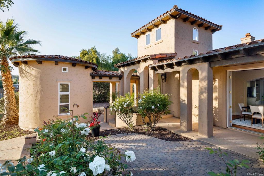 1455 Independence Way Vista, CA 92084 - Photo 25 of 31 a front view of a house with garden