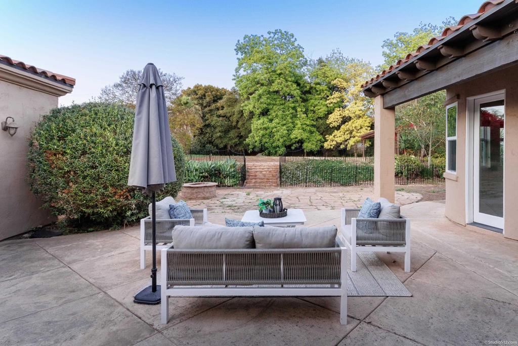 1455 Independence Way Vista, CA 92084 - Photo 29 of 31 a view of a patio with a table and chairs