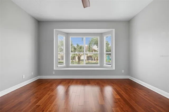 a bathroom with a double vanity sink and mirror