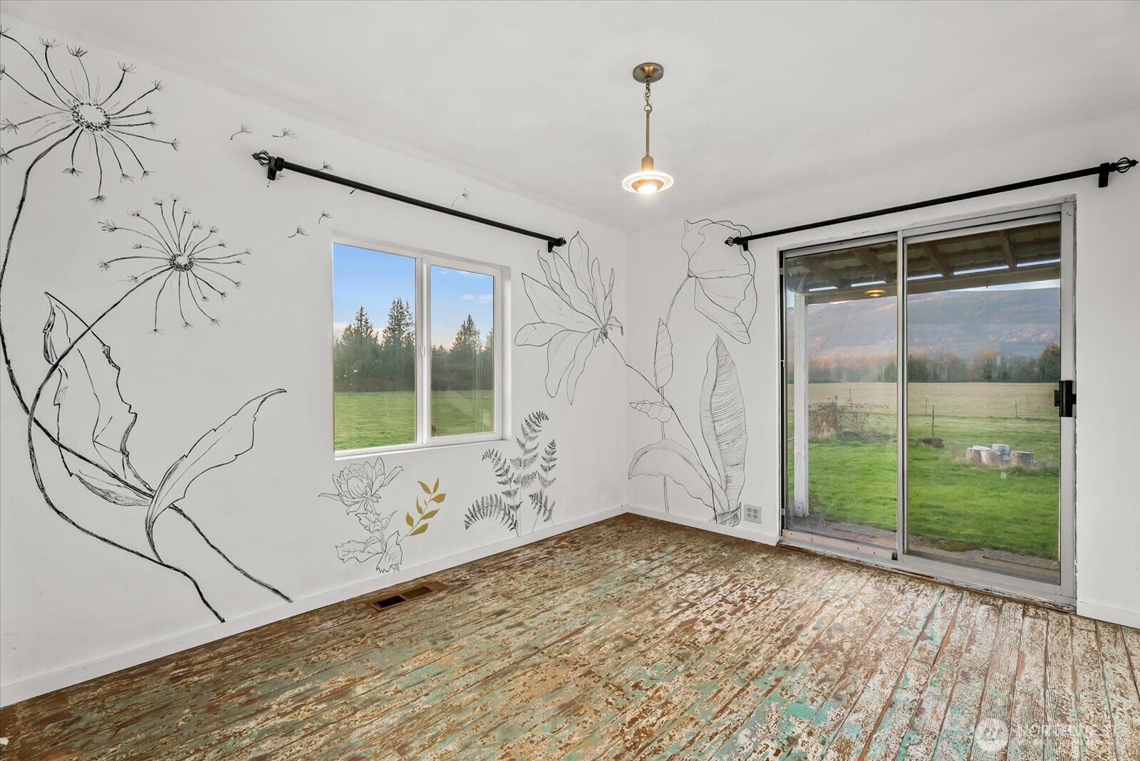 30731 Walberg Road Sedro-Woolley, WA 98284 - Photo 17 of 40 a view of wooden floor and windows in a room