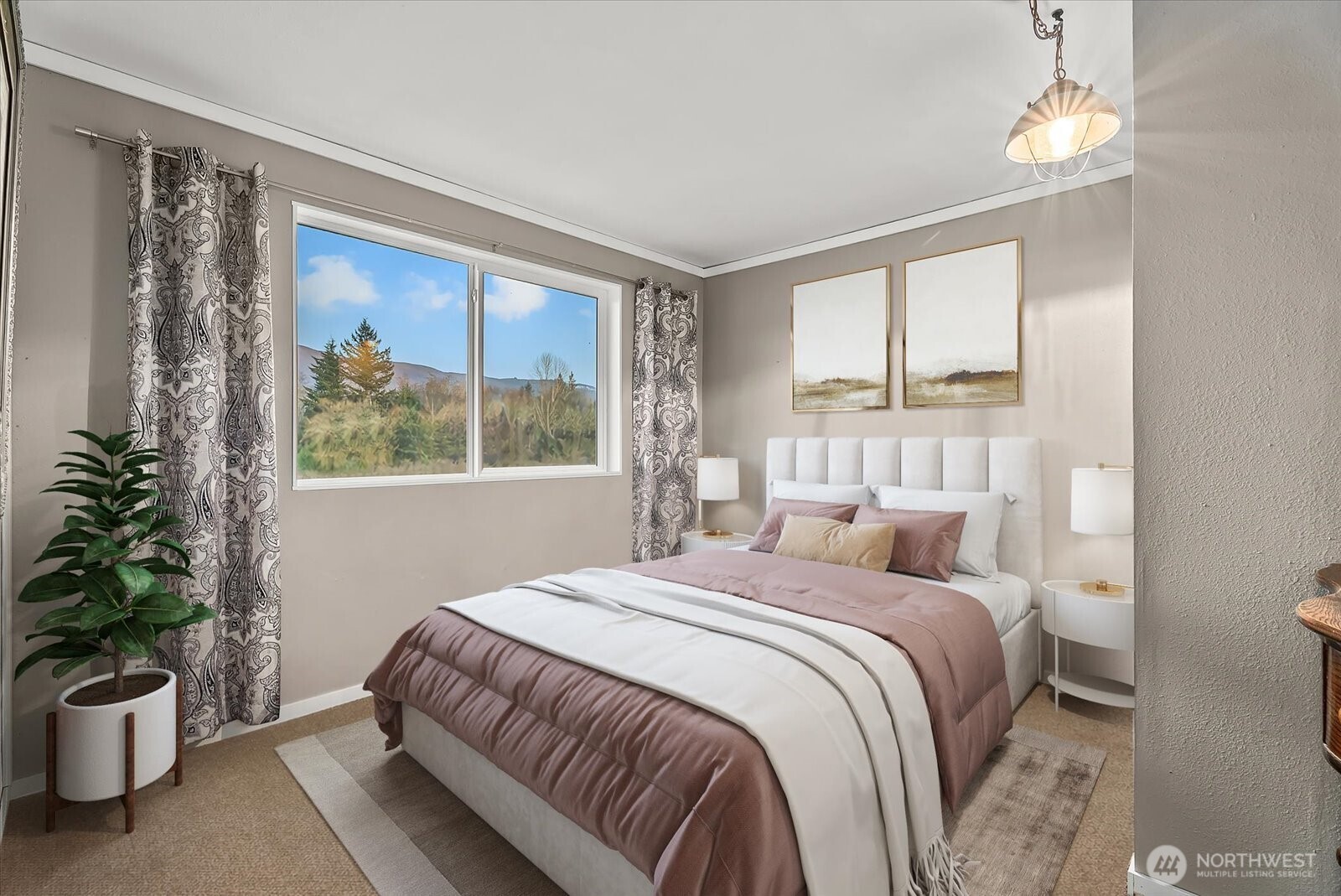 30731 Walberg Road Sedro-Woolley, WA 98284 - Photo 29 of 40 a bedroom with a large bed and a potted plant