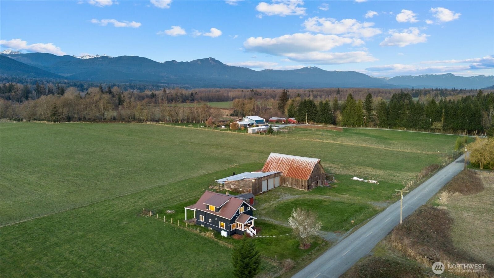 30731 Walberg Road Sedro-Woolley, WA 98284 - Photo 38 of 40 a view of a golf course with a lake