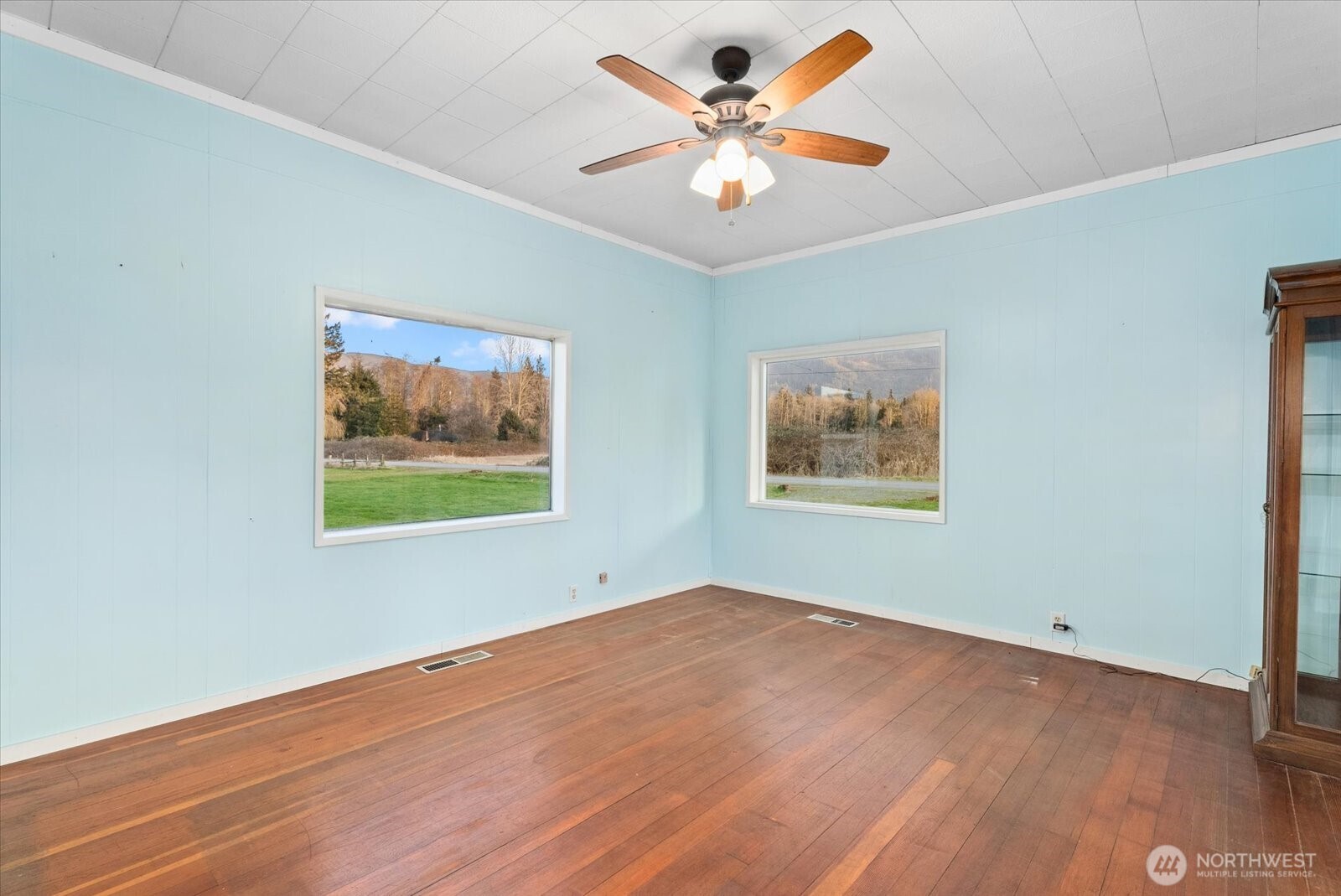 30731 Walberg Road Sedro-Woolley, WA 98284 - Photo 7 of 40 a view of empty room with wooden floor