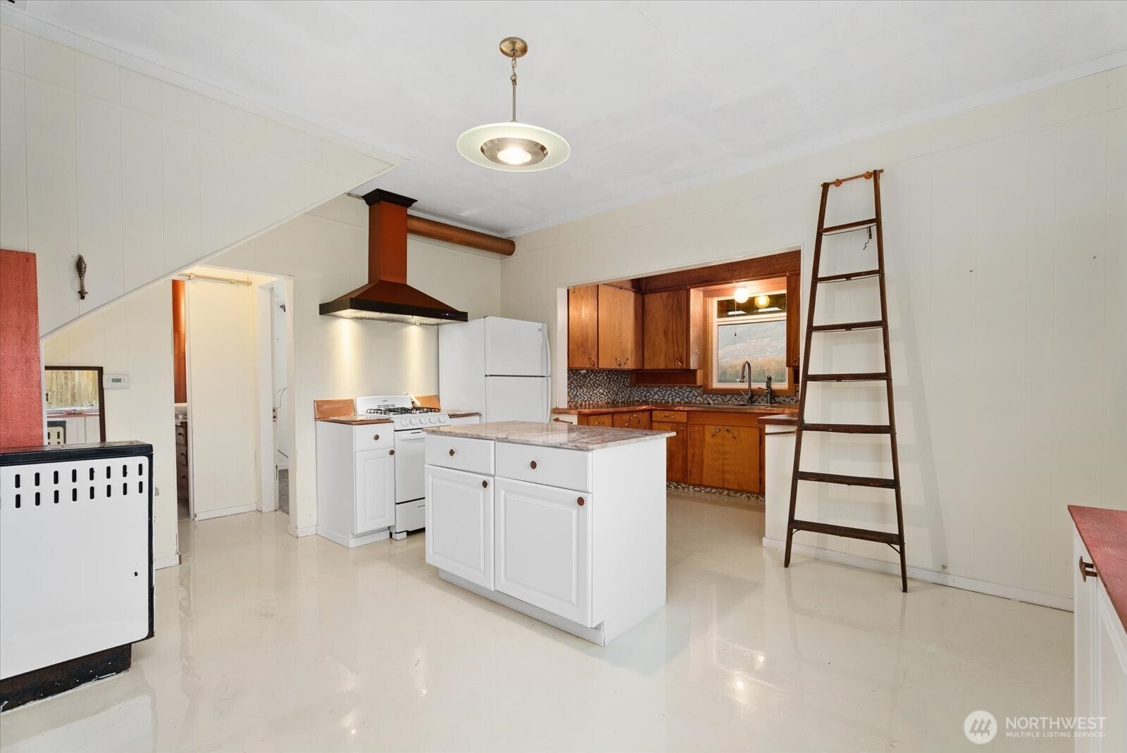 30731 Walberg Road Sedro-Woolley, WA 98284 - Photo 9 of 40 a kitchen with granite countertop white cabinets and stainless steel appliances