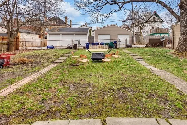 a house view with a garden space