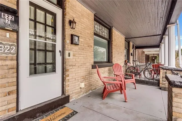 a view of a chairs with a table and chairs