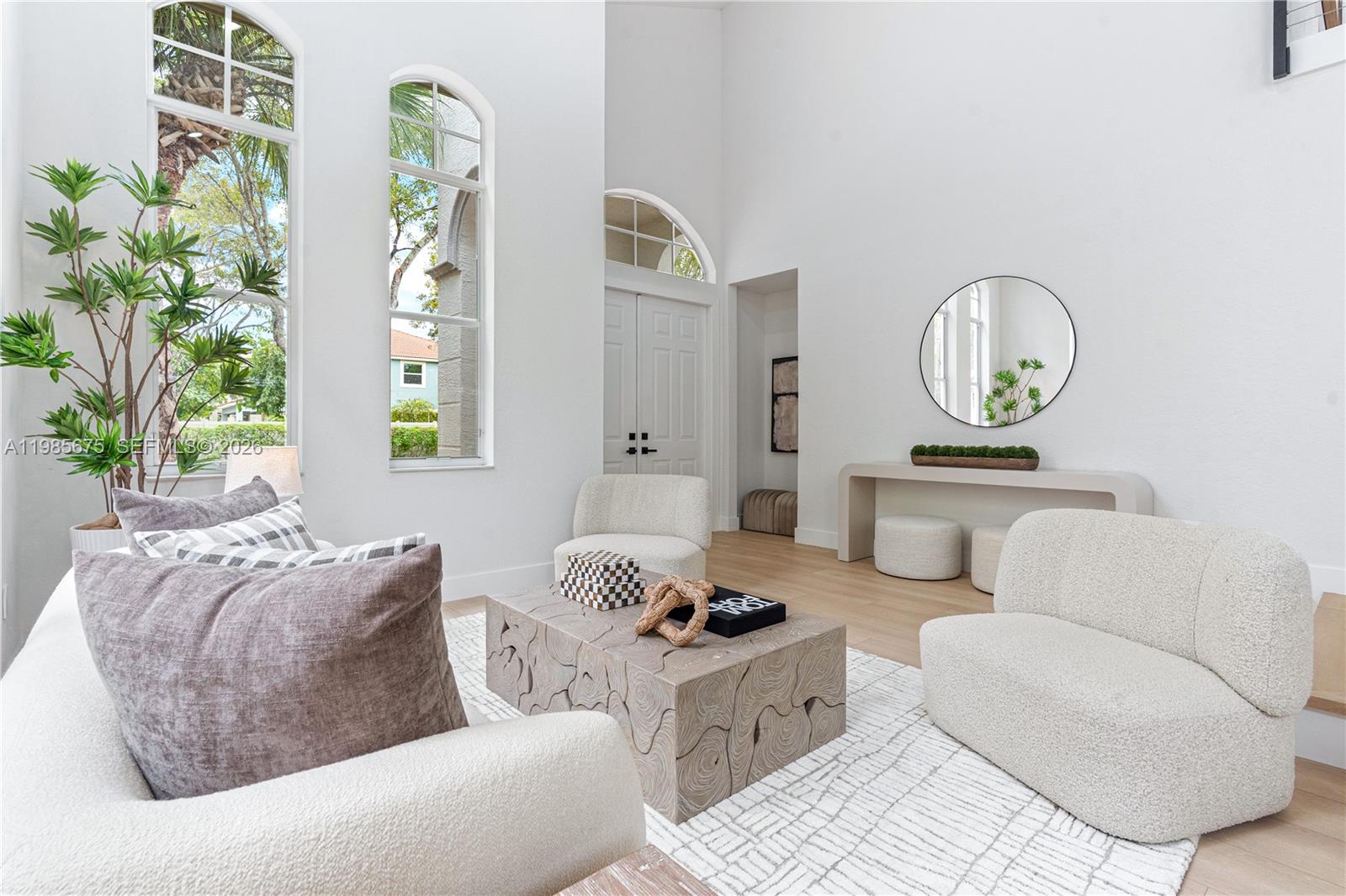 9840 Stover Way Wellington, FL 33414 - Photo 5 of 23 a living room with furniture and a window