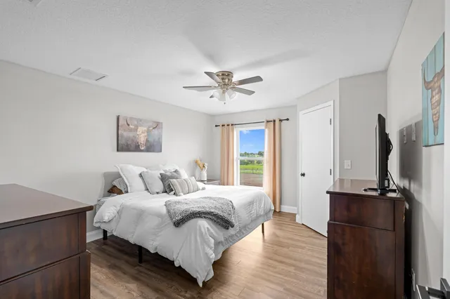 a bathroom with a tub a sink and a shower