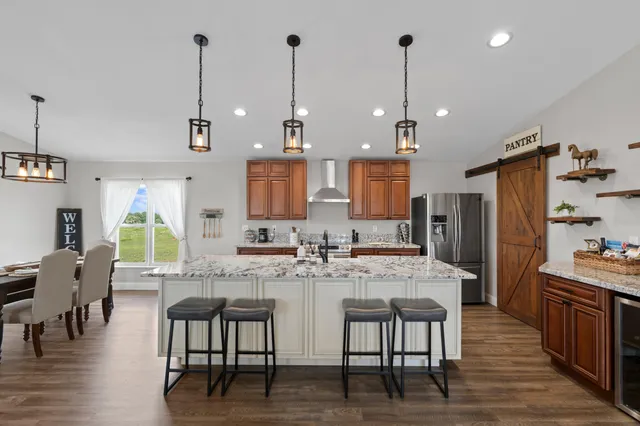 a bathroom with a sink a mirror and a shower