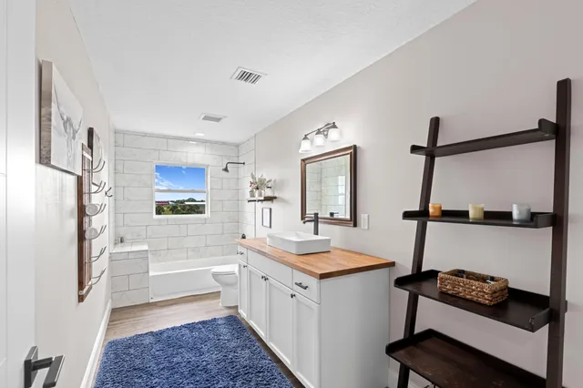 a view of a room with racks on the wall