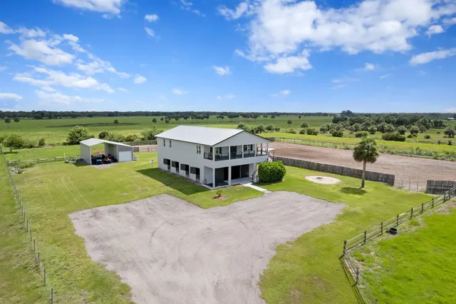 a view of an outdoor space pool patio and outdoor seating