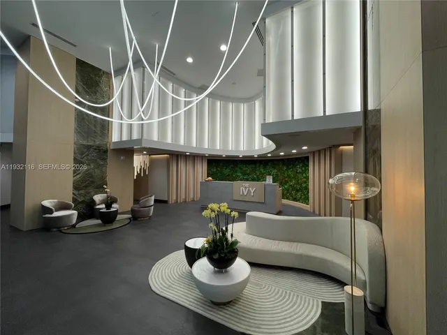 a room with gym equipment and a wooden floor