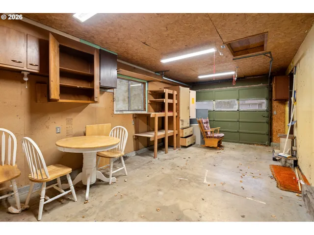 a room with furniture and a flat screen tv