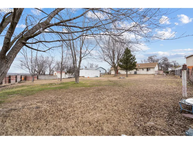 a view of open space with a garden