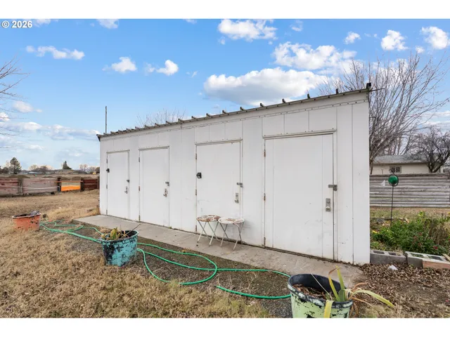 a view of open space with yard